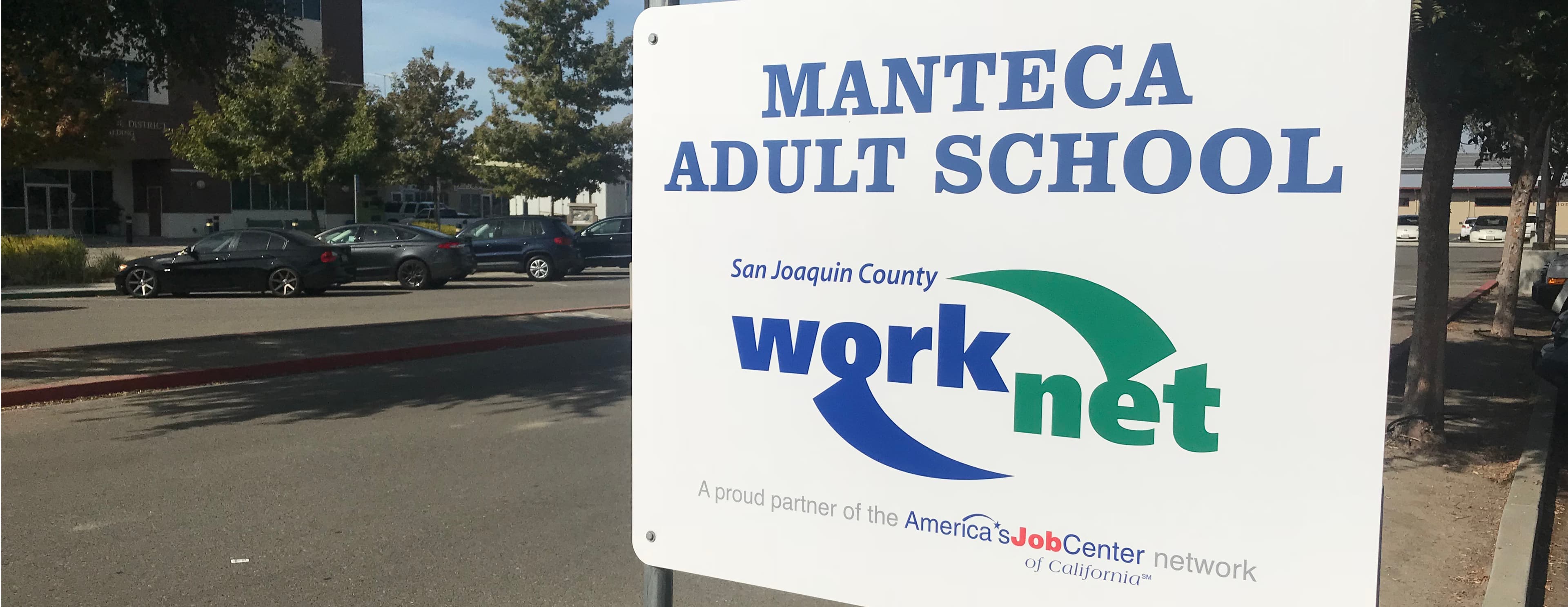 Sign/Poster indicating that the location is the Manteca's WorkNet Center